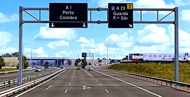 Placas de autoestrada mostrando direções para Porto e Coimbra pela A1 e para Guarda pela A23, com várias faixas de circulação, principal via de acesso à região do Sabugal.